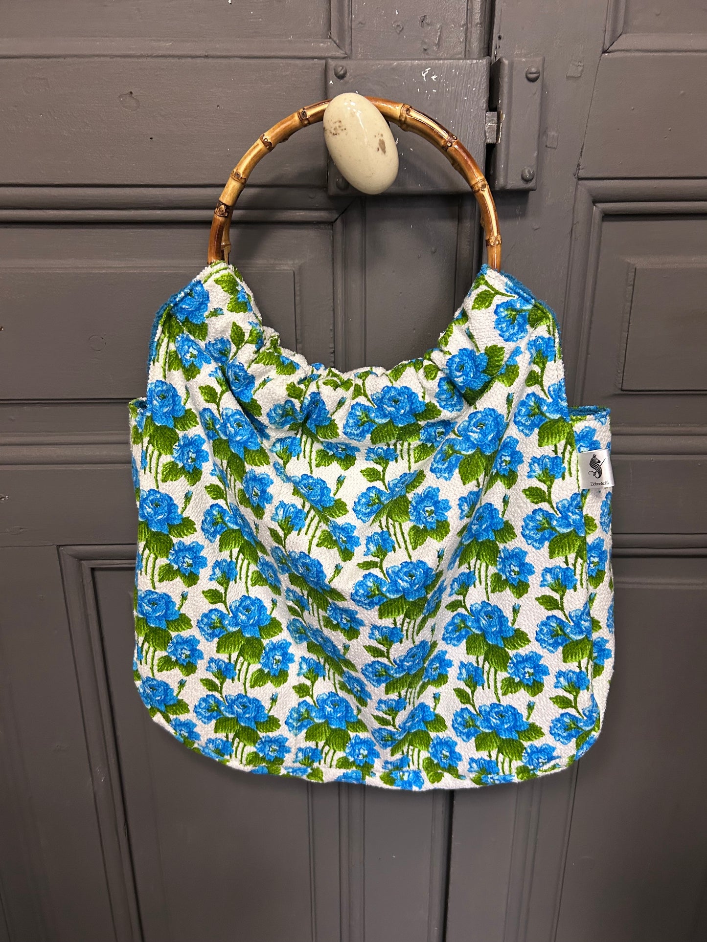 Sac éponge fleurs bleues